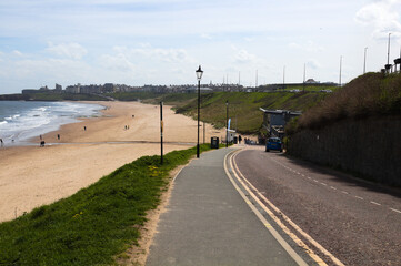 Road and beach at Tynemouth Northumberland UK