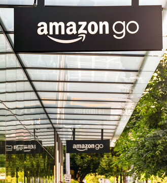 Seattle, Washington State, USA - June 2018: Signs outside the Amazon Go store in Seattle city centre. payment in the store is made automatically for goods purchased with no checkout.