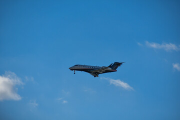 private jet airplane preparing to land