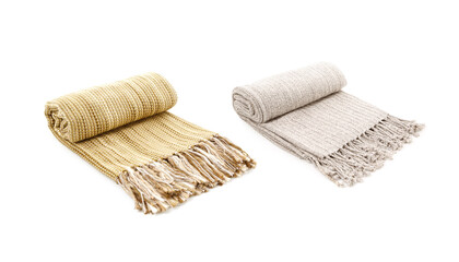 Rolled Two wool beige and yellow blankets isolated on white background