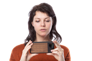 Female tourist or photographer doing mobile photography with a cell phone as an alternative...
