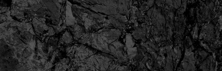Black stone background. Dark gray grunge banner and  mountain texture. Black and white background