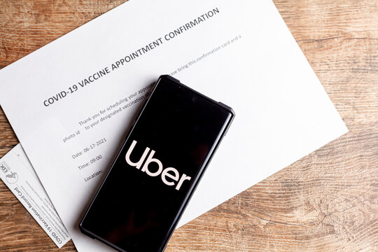 Clarksburg, MD, USA 05-12-2021: Biden administration announced an agreement that ride share apps  lyft and uber will offer free transportation to vaccination sites to increase COVID-19 vaccine rates