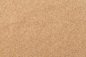 Organic buckwheat flour, dry ground grits or flake, closeup. Natural food background with copy space