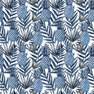 Watercolor seamless pattern with pineapples and tropical leaves.