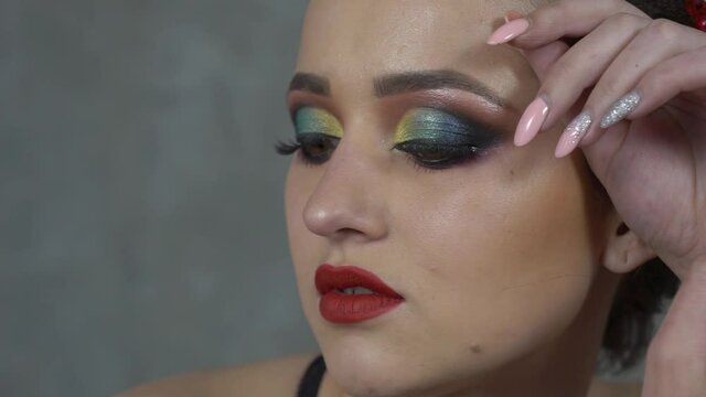 Slow Motion Portrait of fashion model girl indoors