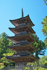 Niigata,Japan-October 21, 2020: A five-story pagoda in Myosenji temple in Sado, Niigata, Japan, on blue sky background

