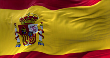 close up view of the Spanish national flag waving in the wind