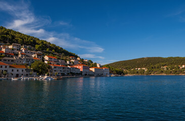 Fototapeta na wymiar Pucisca is small town on Island of Brac, popular touristic destination on Adriatic sea, Croatia. August 2020.