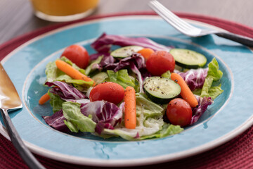 Fresh salad and oranje juice