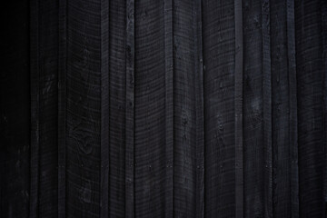 Vertical Dark Wood Siding
