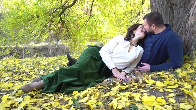 Slow Motion Happy middle-aged couple outdoors on beautiful autumn day