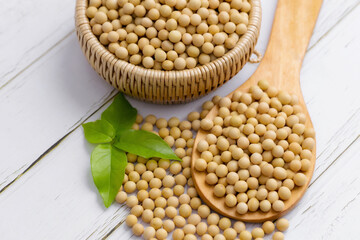 Soybean or soya bean in a bowl on white table background, healthy concept.