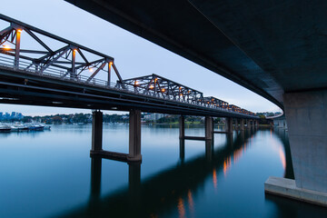 Curve bridge and Iron Cove Bridge at dawn, Sydney, Australia.