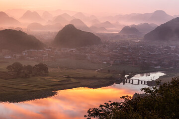 Sunrise over Puzhehei in Yunnan - China