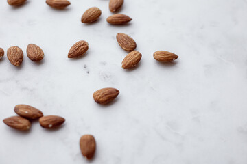Almonds and white marble  tray