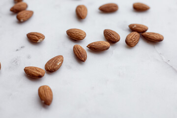Almonds and white marble  tray