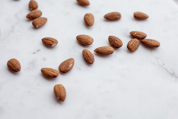 Almonds and white marble  tray