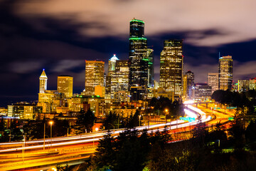 Fototapeta na wymiar Night city view of Seattle city scape at night time,Long Exposure picture of Downtown Seattle,WA, USA