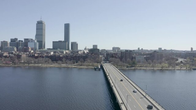 Harvard Bridge against waterfront, Back Bay, Boston cityscape. Aerial pullback