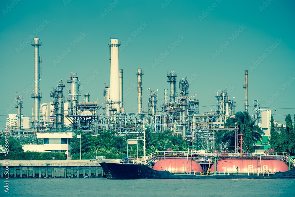 Wall mural oil refinery plant factory in industry economic zone. petrochemical, petroleum, power energy and eng