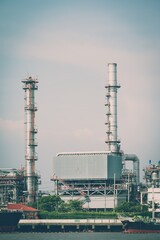 Oil refinery plant factory in industry economic zone. Petrochemical, petroleum, power energy and engineering concept