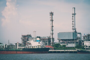 Oil refinery plant factory in industry economic zone. Petrochemical, petroleum, power energy and...