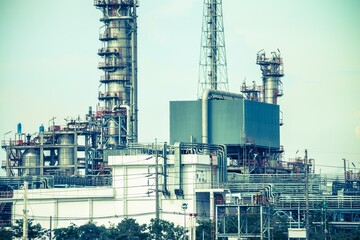 Oil refinery plant factory in industry economic zone. Petrochemical, petroleum, power energy and engineering concept