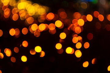 Gold bokeh on black background