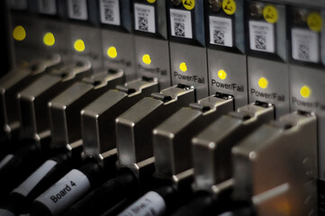 Network connection technology with broadband aggregation carrier electronic equipment, row of data cables and status LEDs to show working status of data center equipment in mobile telecommunications