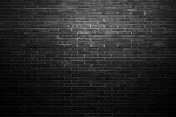 The black wall surface uses a lot of bricks. Or old black brick wall abstract pattern. Put together beautifully dark background.