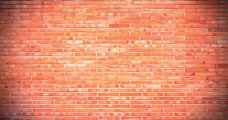 Fototapeta na wymiar The background of the brick wall with dark orange is beautifully arranged. Ancient wall Grunge background The backdrop may be used in interior design.
