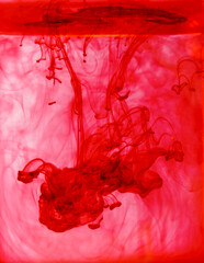 Coloured Inks dropped into water creating magical art and patterns as they mix together