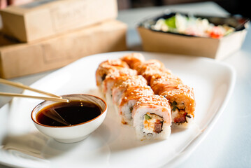sushi with soy sauce in restaurant