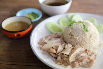 Thai food gourmet steamed chicken with rice on wood background