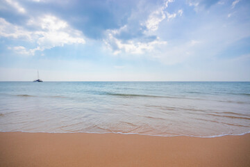 Fototapeta na wymiar Smooth orange beach And the blue sea
