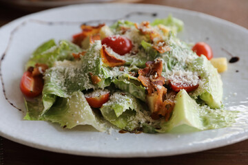 caesar salad appetizer on wooden background