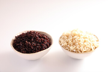 Organic boiled brown rice on bowl isolated in white background