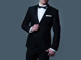 Male suit fashion. Formal suit classic style outfit. Elegant and stylish hipster. Business clothes. Rich lifestyle. Isolated.
