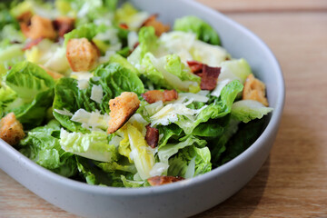 caesar salad appetizer on wooden background