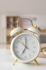 Alarm clock on table in room