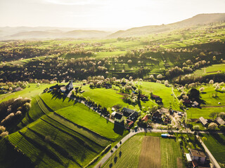 Spring landscape in Slovakia. Polana region, Hrinova. Green spring rural hills landscape, fields, flowering trees, organic farming © Zedspider