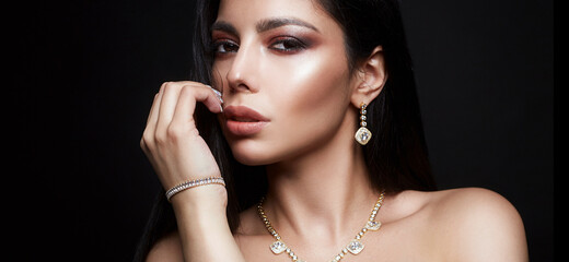 Beautiful sexy woman in jewelry and Make-up