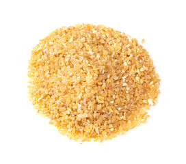 pile of raw wheat groats closeup on white