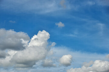 Beautiful white clouds on blue sky background.