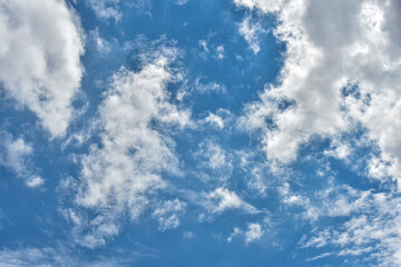 Beautiful white clouds on blue sky background.