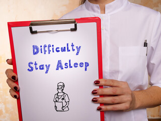 Medical concept meaning Difficulty Stay Asleep with phrase on the sheet.
