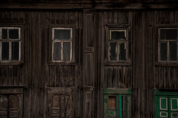 Fototapeta na wymiar old abandoned non-residential wooden house.