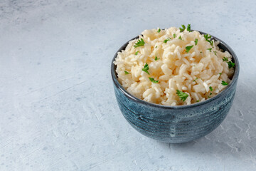 White rice in a bowl with copy space