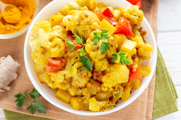 Curry roasted cauliflower - vegetarian vegetable dish, selective focus